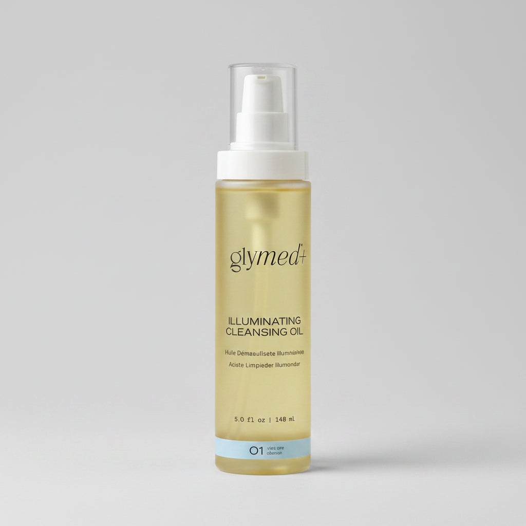 A bottle of glymed+ Illuminating Cleansing Oil on a light beige background. The bottle is filled with a pale yellow oil and features a white pump dispenser with a clear cap, and a light blue accent band at the bottom.