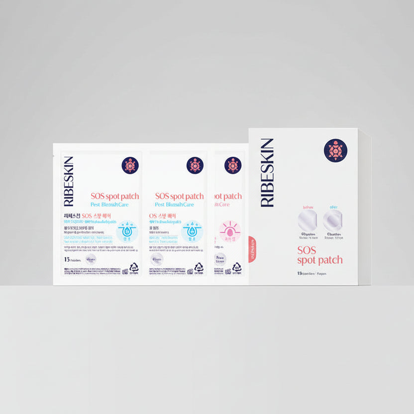 Three boxes of RIBESKIN SOS spot patches on a light gray background